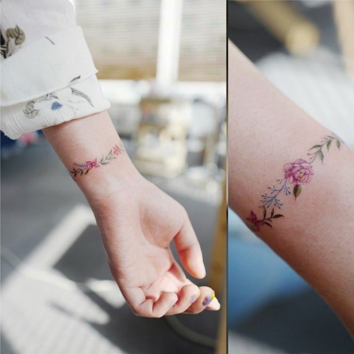 tatuaje cadena flor de loto